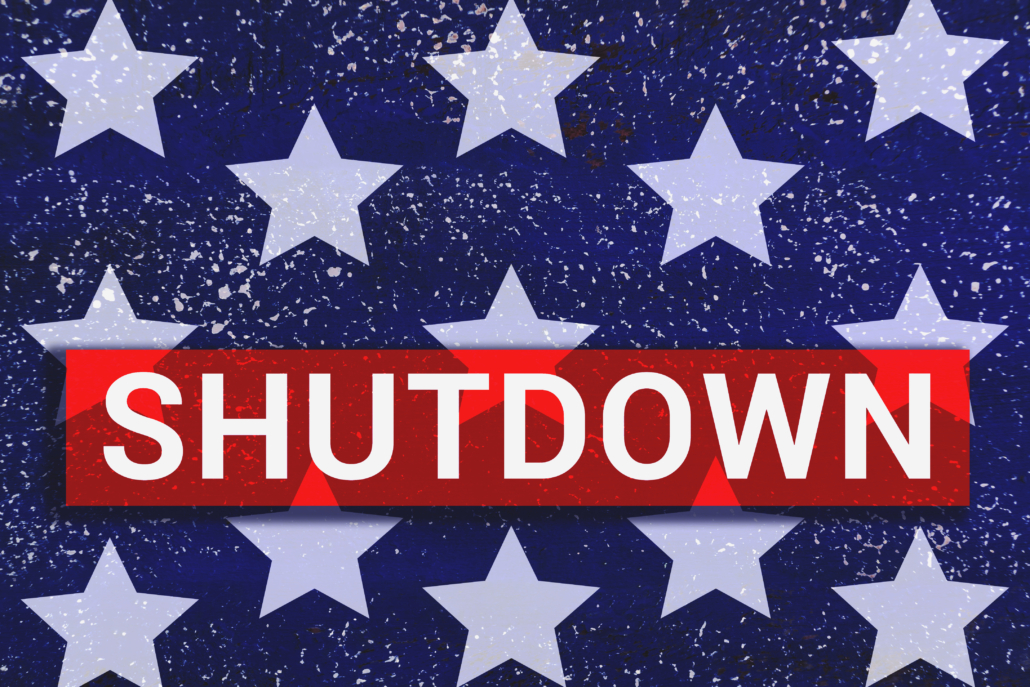 Shutdown Text With stars of Us Flag on blue background