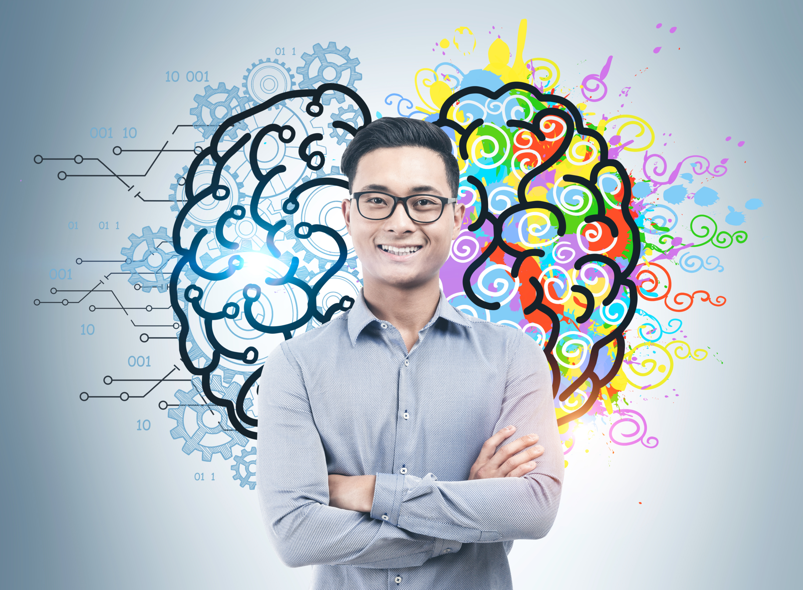 A man in a button down shirt smiles for the camera. In the background, a drawing of a brain with the right side showing splashes or color for creativity. The left side gears representing processing. Emotional Intelligence (EI)