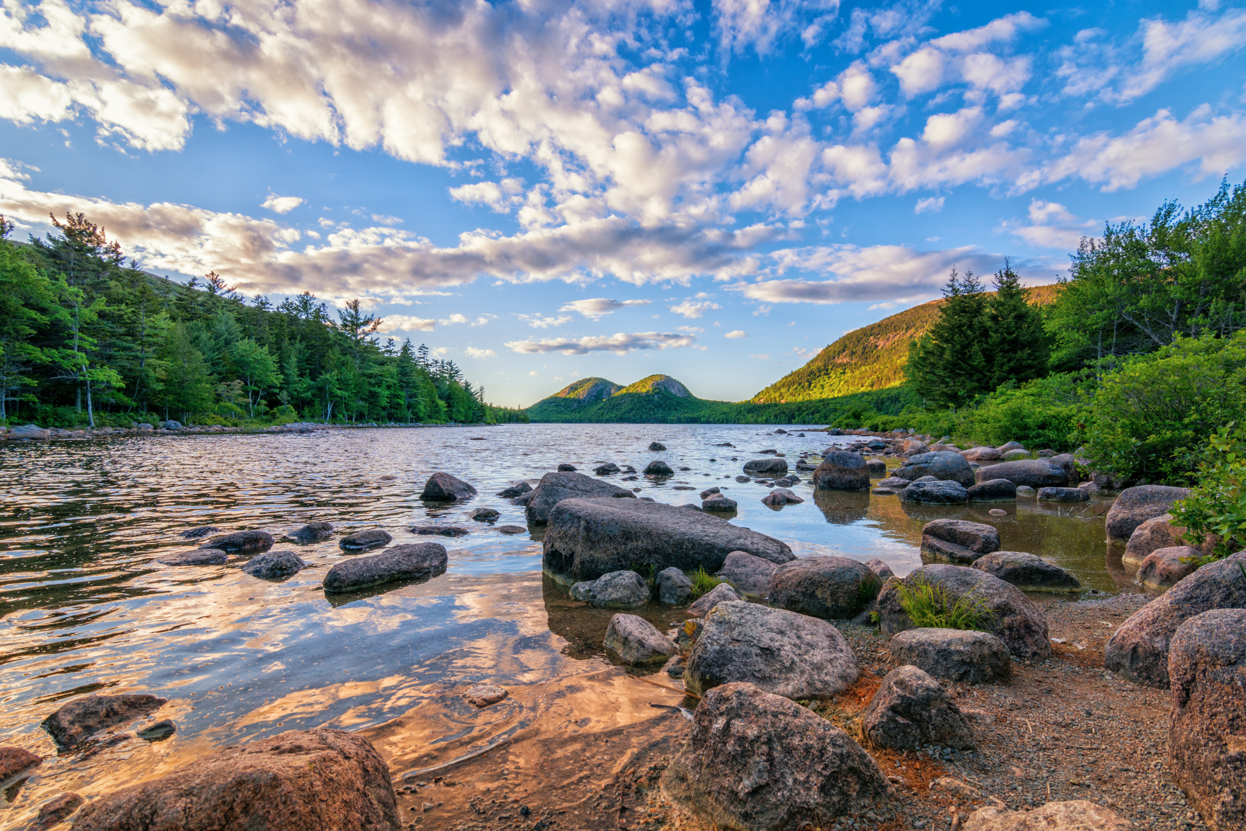 Jordan Pond at Acadia National Park one of over 425 National Parks in the United States. Daytime at Rocky shore